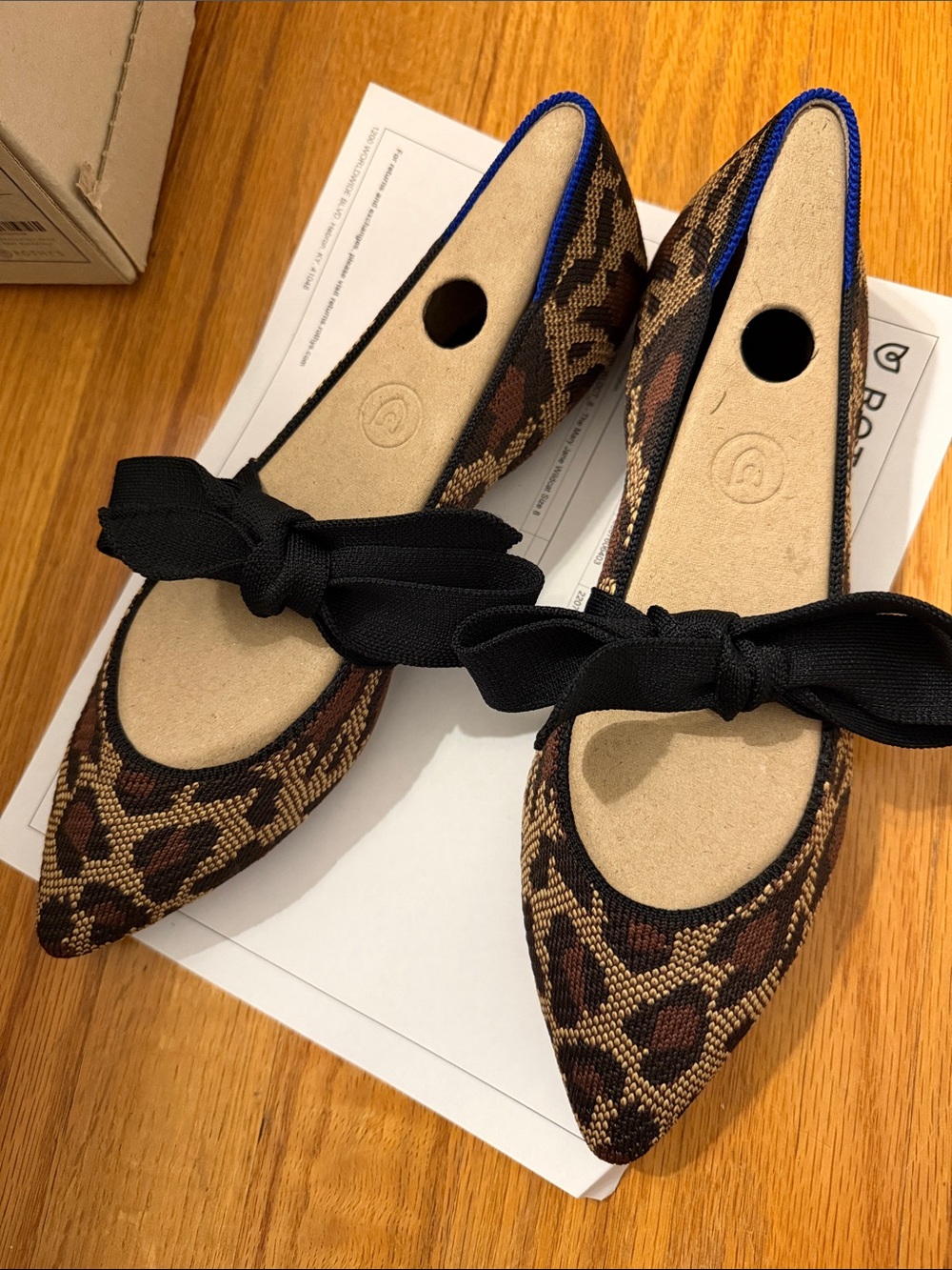Rothy's Leopard Print Pointed Flats with Black Bow